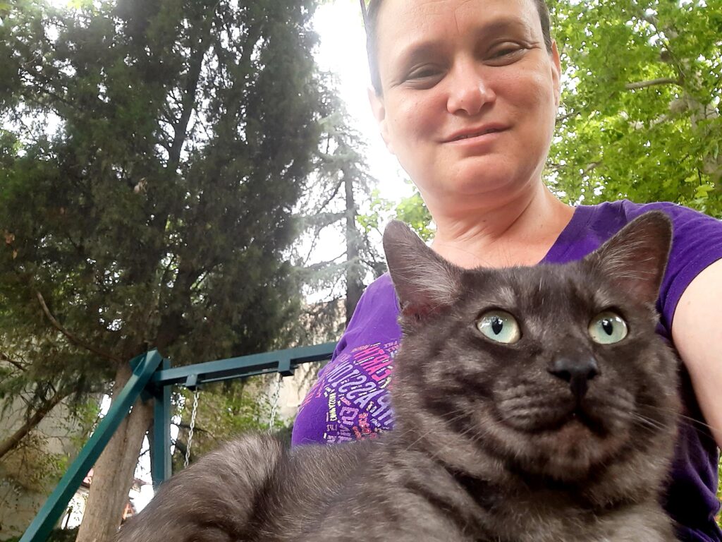 With a cat on my lap in Tbilisi, Georgia