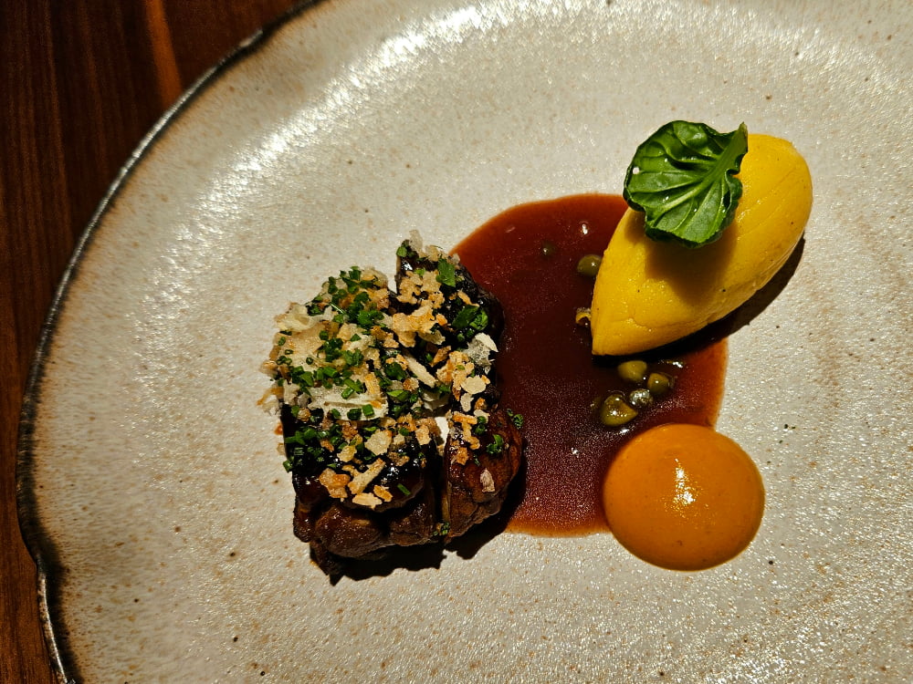 Lion's mane steak and polenta at Jola, Vienna