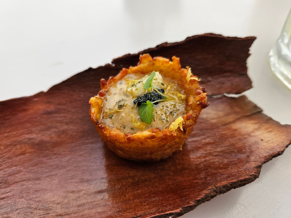 Amuse-bouche tartlet at Koukoumi