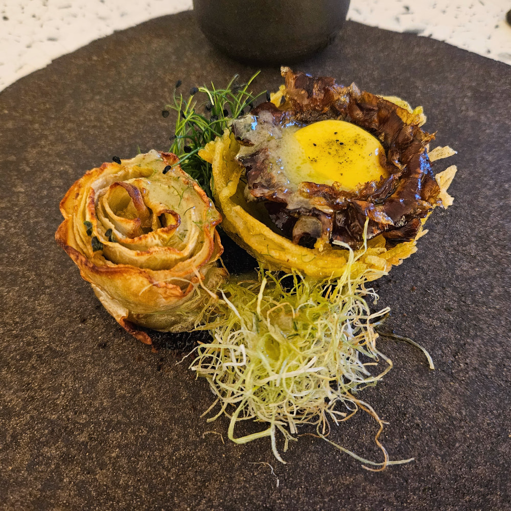 An artichoke dish from the tasting menu at Koukoumi