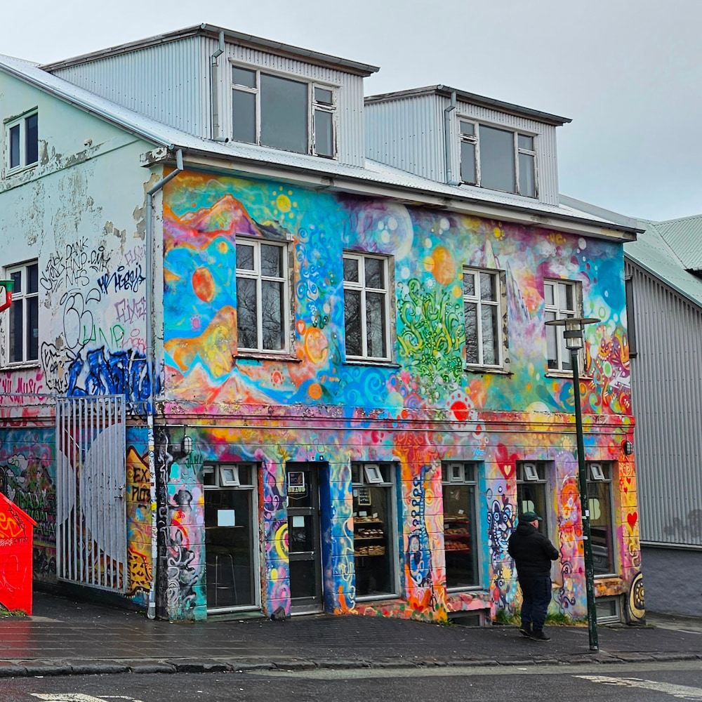 Exterior of Braud and Co, covered in colorful graffiti – Reykjavik, Iceland