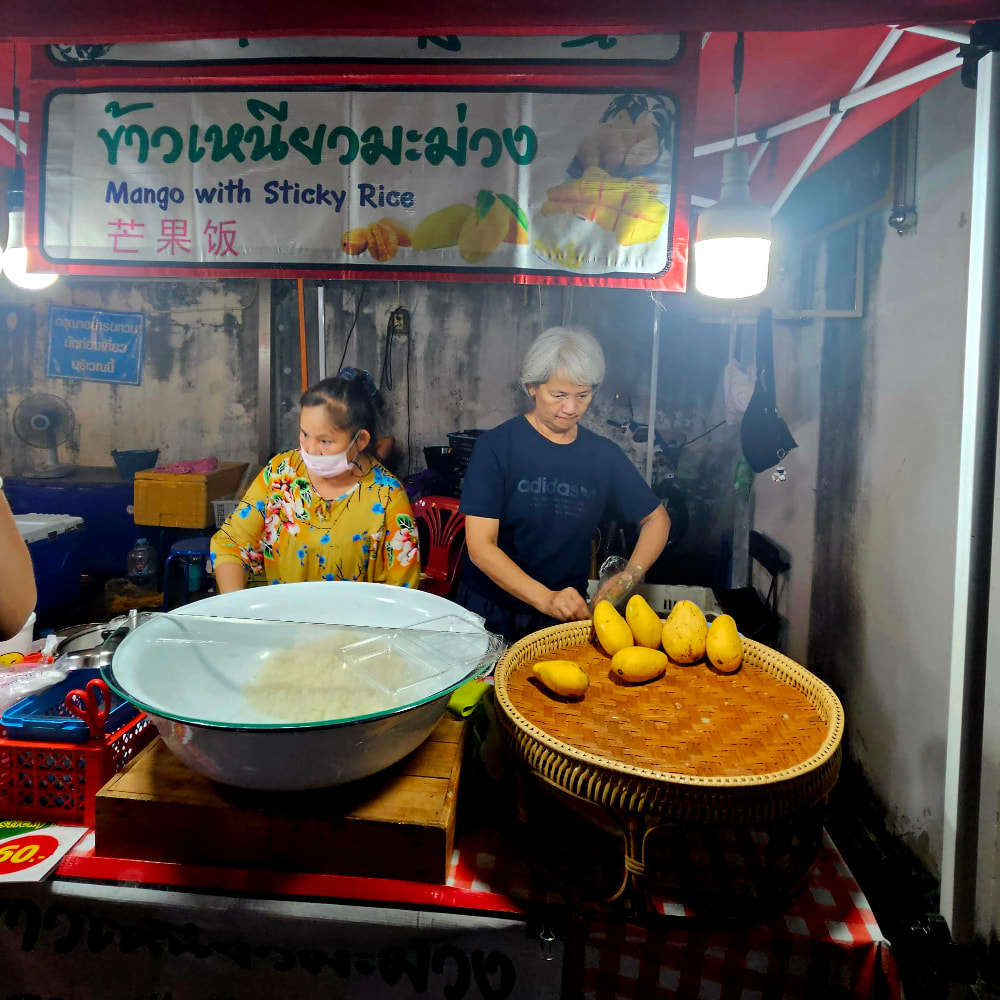 Mango sticky rice stall at Chiang Mai Sunday Night Market, Thailand
