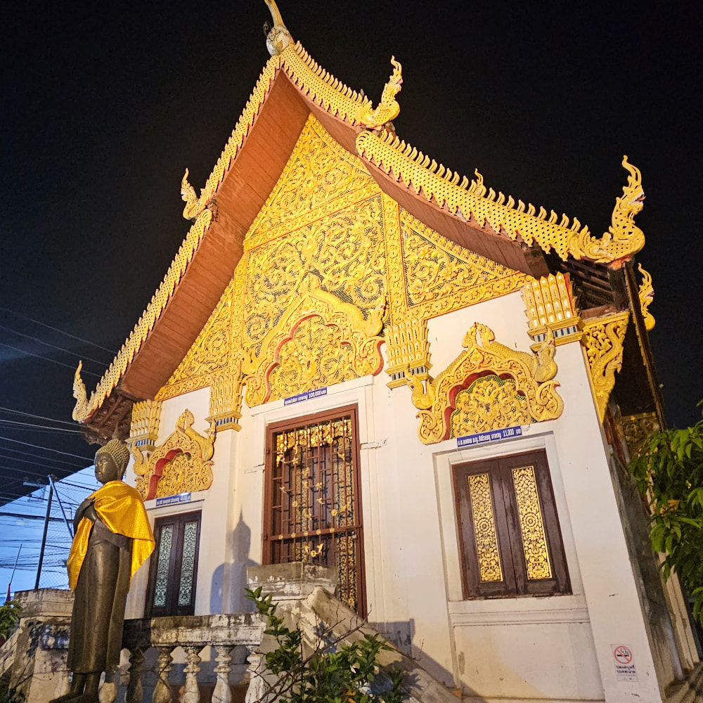 Chiang Mai temple, white and gold at night